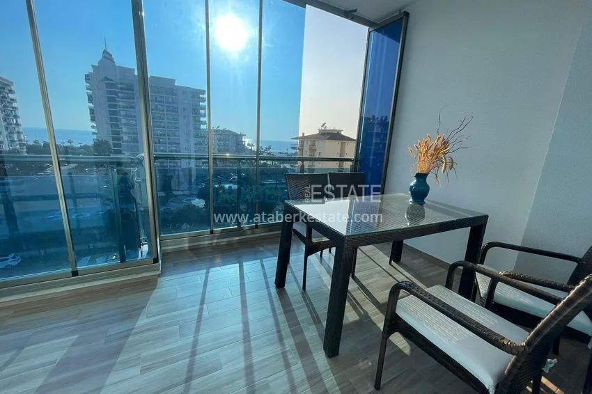 Purchase  1+1 apartment in Mahmutlar - furniture, glazed balcony, sea view, 200 m to the beach 11 