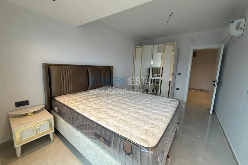 Purchase 2+1 duplex in Mahmutlar with furniture and sea and mountain views 11 