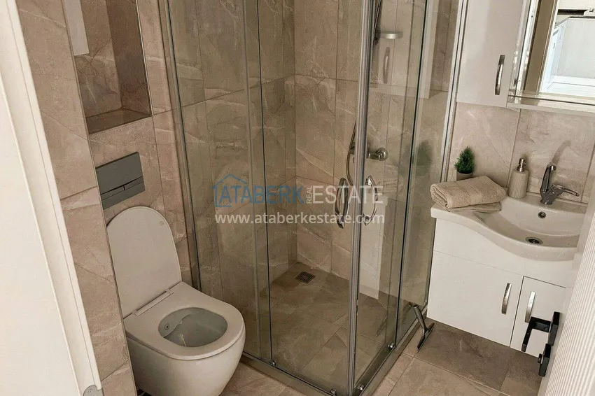 Purchase  Two-room apartment in Alanya, Oba area — 60 m2 furnished and mountain views  12 