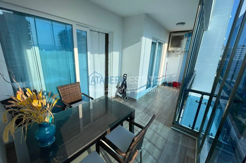 Purchase  1+1 apartment in Mahmutlar - furniture, glazed balcony, sea view, 200 m to the beach 12 