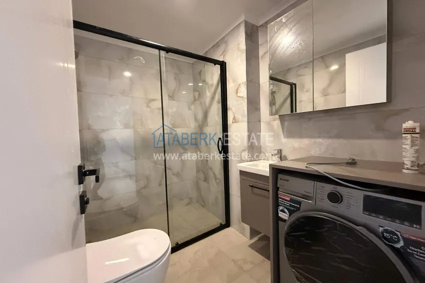 Purchase 2+1 duplex in Mahmutlar with furniture and sea and mountain views 12 