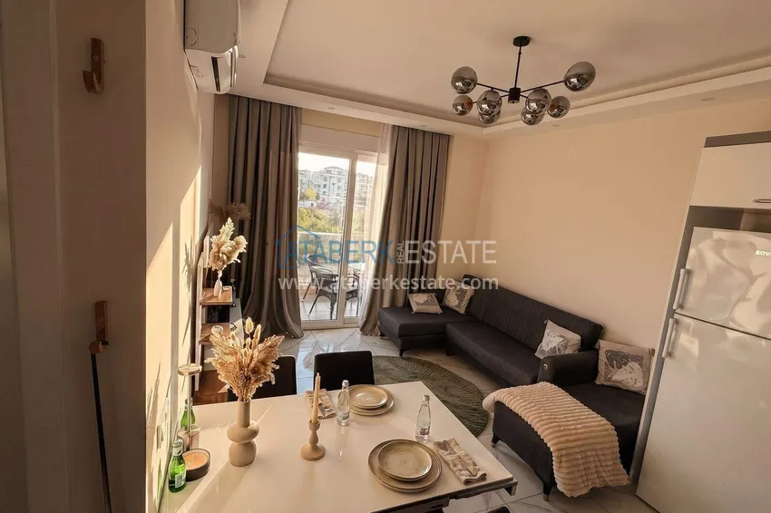 Purchase  Two-room apartment in Alanya, Oba area — 60 m2 furnished and mountain views  1 