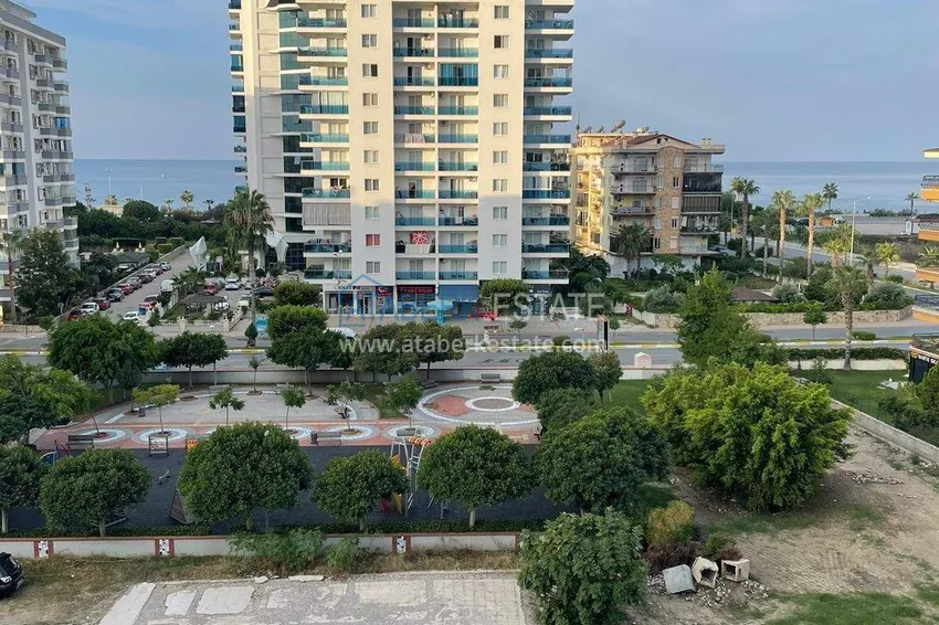 Purchase  1+1 apartment in Mahmutlar - furniture, glazed balcony, sea view, 200 m to the beach 18 