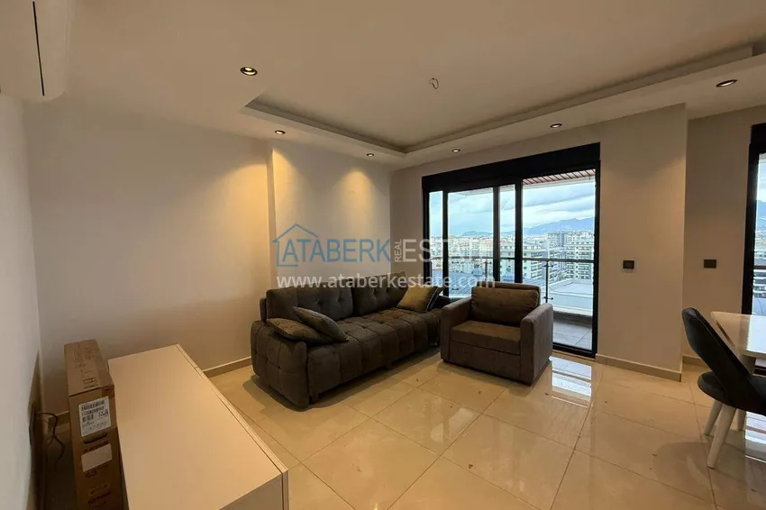 Purchase 2+1 duplex in Mahmutlar with furniture and sea and mountain views 2 