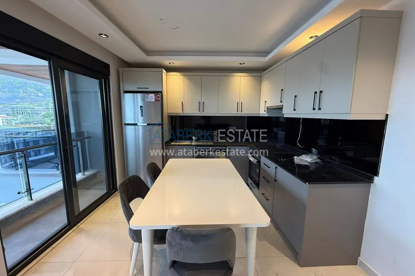 Purchase 2+1 duplex in Mahmutlar with furniture and sea and mountain views 3 