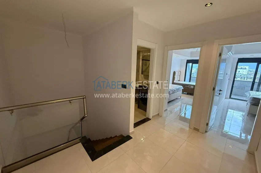 Purchase 2+1 duplex in Mahmutlar with furniture and sea and mountain views 8 