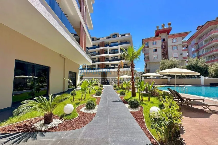 Three-room apartment in the center of Alanya - new property in a comfort-class residence 12 