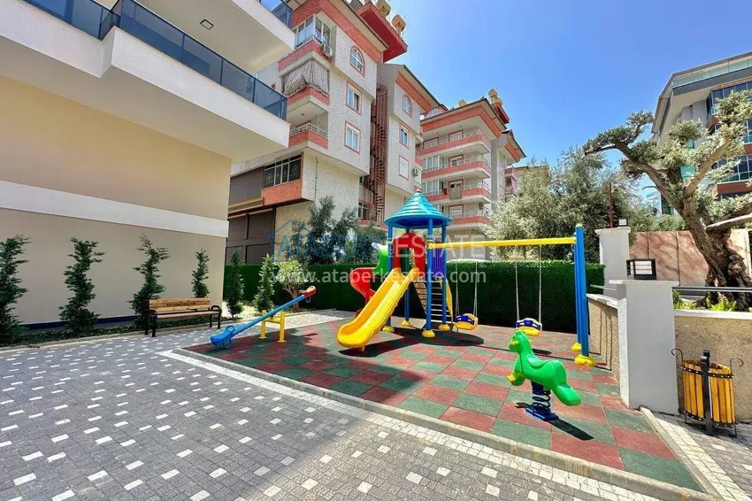 Three-room apartment in the center of Alanya - new property in a comfort-class residence 14 