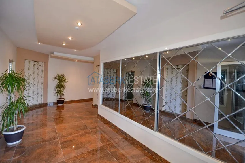 Apartment 1+1 70 m2 in Kestel — furnished, glazed balcony, 100 meters from the sea 14 