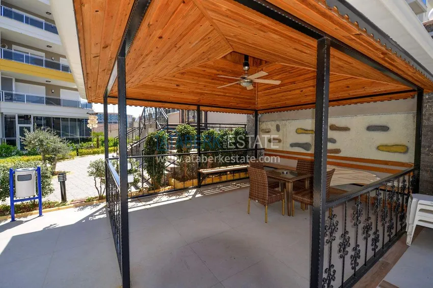 Apartment 1+1 70 m2 in Kestel — furnished, glazed balcony, 100 meters from the sea 9 