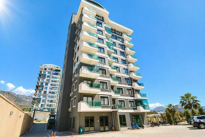 1+1 apartment at a bargain price in Mahmutlar — furnished and with mountain views 12 