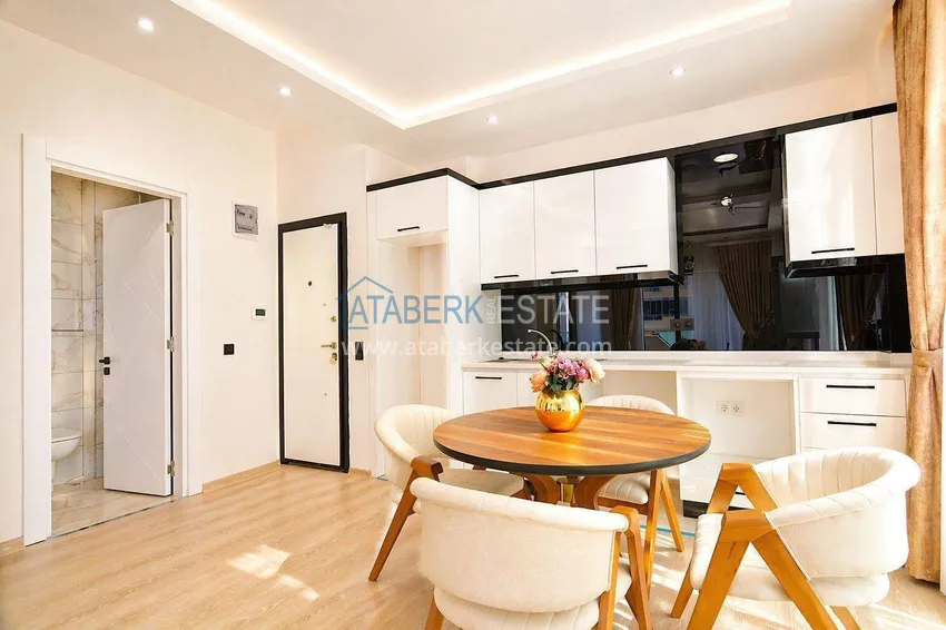 Purchase 1+1 apartment at a bargain price in Mahmutlar — furnished and with mountain views 4 