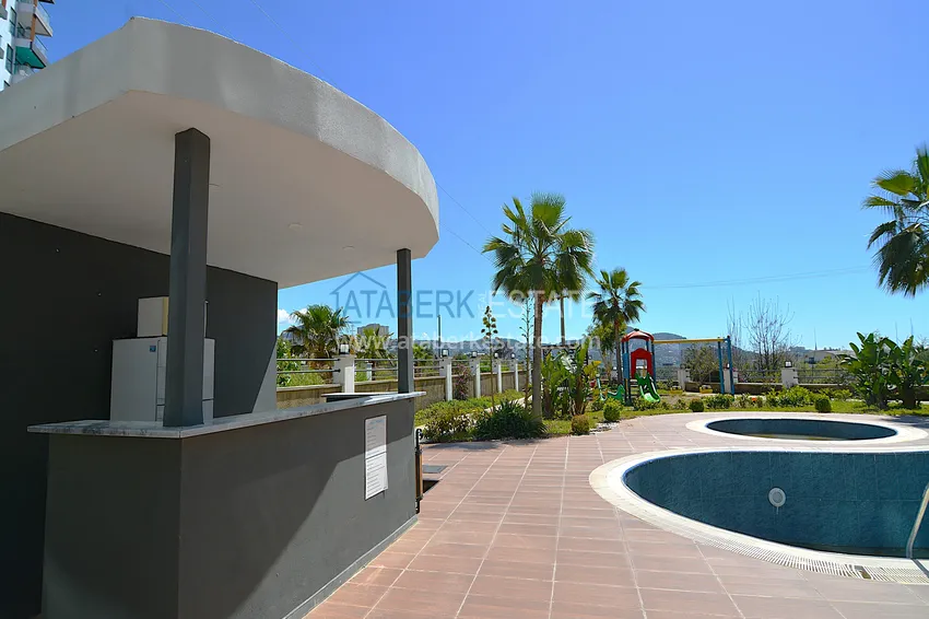 1+1 apartment at a bargain price in Mahmutlar — furnished and with mountain views 7 