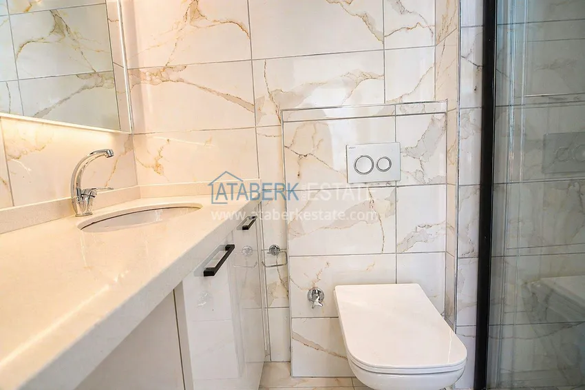 Purchase 1+1 apartment at a bargain price in Mahmutlar — furnished and with mountain views 7 