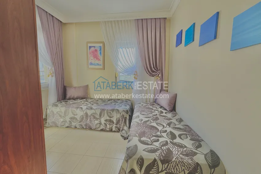 Purchase  Furnished 2+1 apartment in the center of Oba - 15-month installment plan, suitable for a residence permit  16 