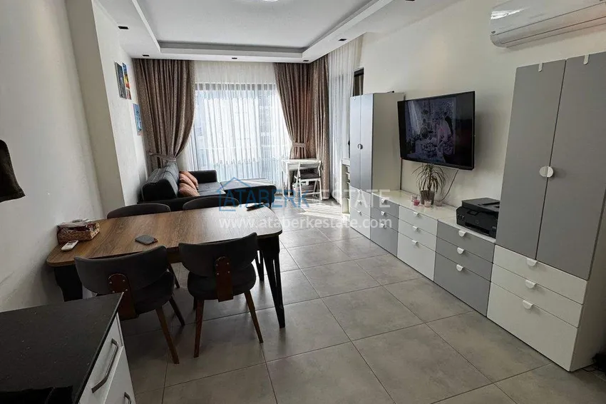 Purchase  Long-term rent in Mahmutlar — one bedroom apartment with furniture No. 38 6 