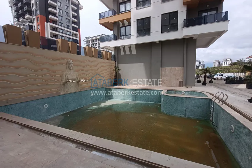 1+1 apartment in the center of Mahmutlar - affordable price, new building 7 