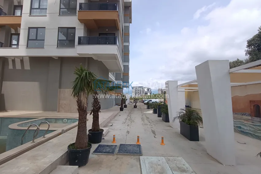 1+1 apartment in the center of Mahmutlar - affordable price, new building 8 
