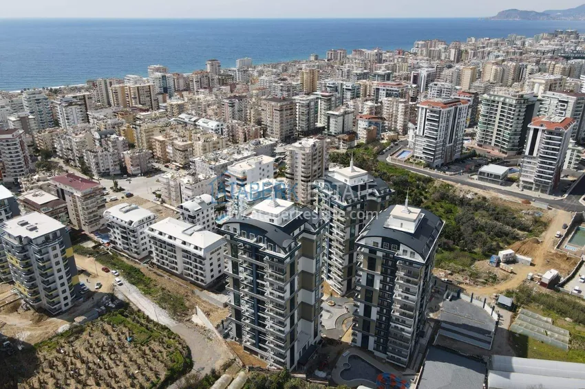 2+1 penthouse duplex in Mahmutlar — furniture, sea and mountain views, complex with hotel-level service 1 