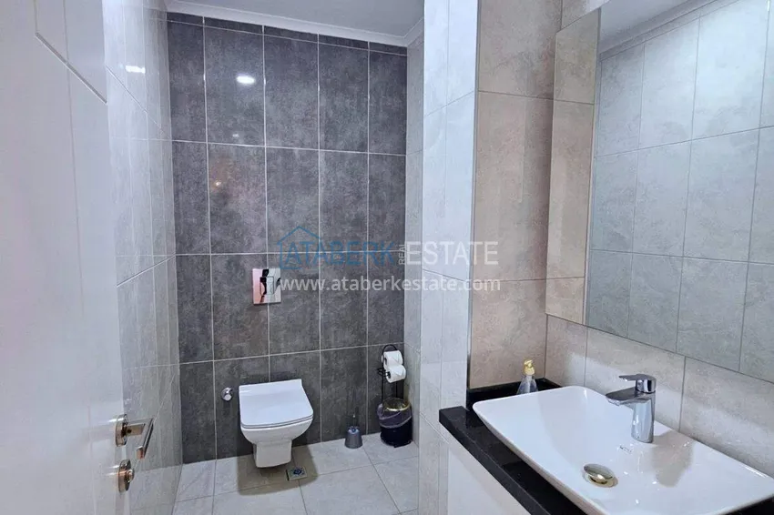 Purchase  2+1 penthouse duplex in Mahmutlar — furniture, sea and mountain views, complex with hotel-level service 11 