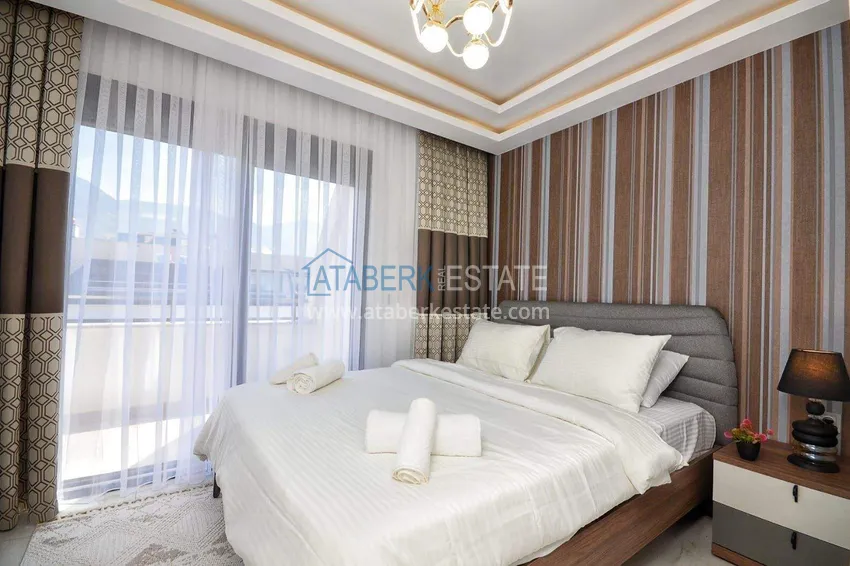 Purchase  Penthouse duplex 2+1 in Mahmutlar — furnished and with mountain views, near the center 20 