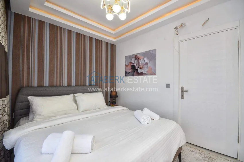 Purchase  Penthouse duplex 2+1 in Mahmutlar — furnished and with mountain views, near the center 21 