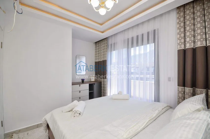 Purchase  Penthouse duplex 2+1 in Mahmutlar — furnished and with mountain views, near the center 23 