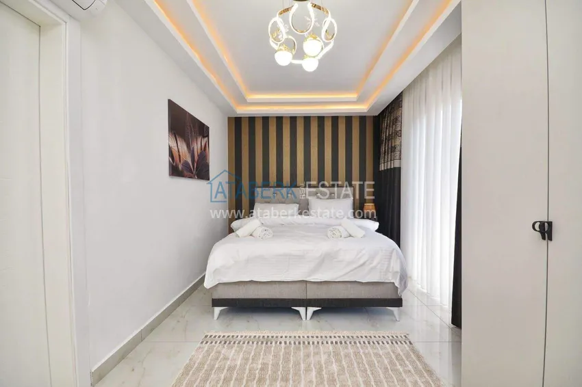 Purchase  Penthouse duplex 2+1 in Mahmutlar — furnished and with mountain views, near the center 25 