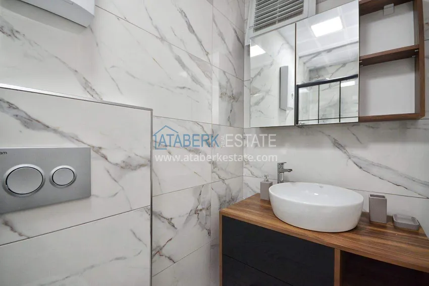 Purchase  Penthouse duplex 2+1 in Mahmutlar — furnished and with mountain views, near the center 31 