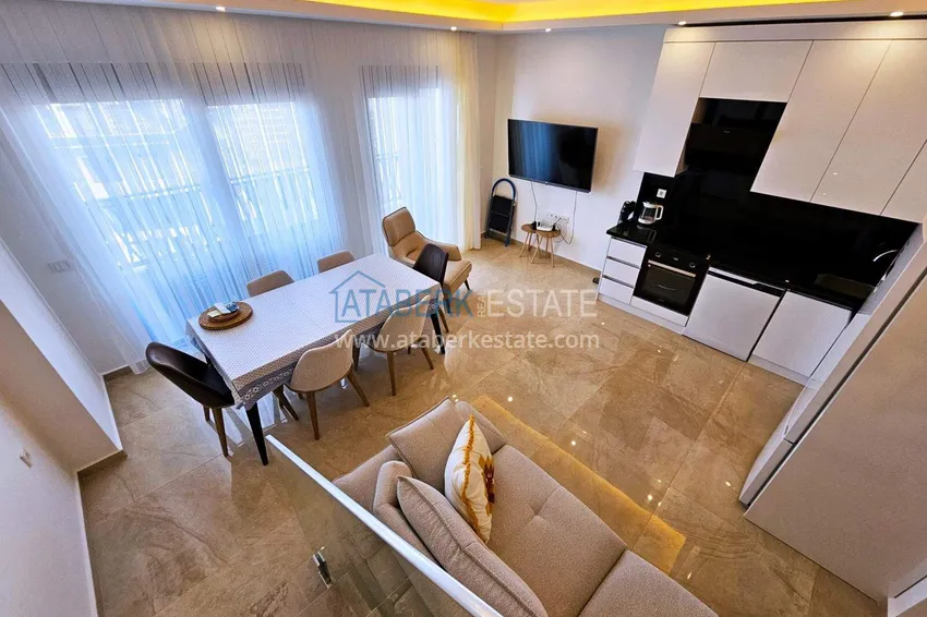 Purchase  2+1 penthouse duplex in Mahmutlar — furniture, sea and mountain views, complex with hotel-level service 4 