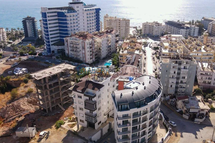 Apartment and penthouse in Tosmur - single price for two properties, 300 m from the sea  1 