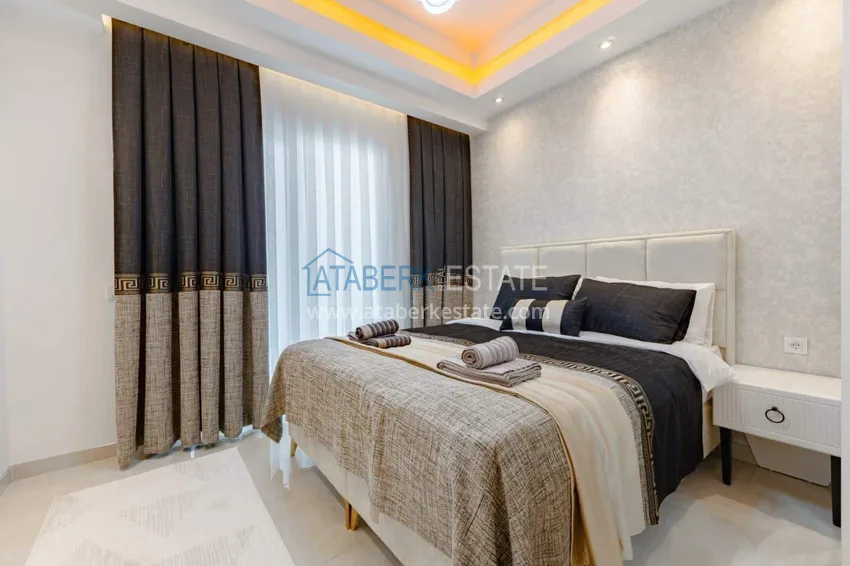 Purchase  1+1 panoramic apartment in the center of Mahmutlar - luxury furniture, the sea within walking distance 10 