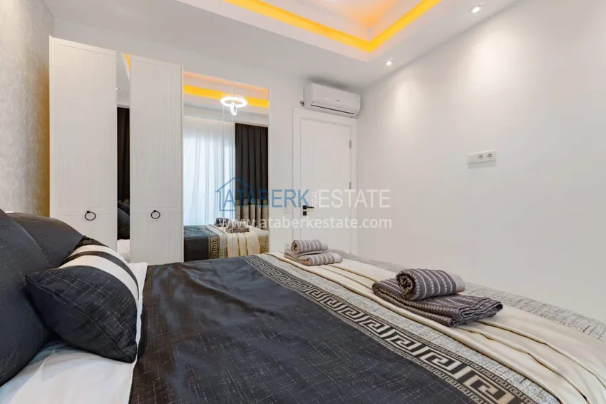 Purchase  1+1 panoramic apartment in the center of Mahmutlar - luxury furniture, the sea within walking distance 12 