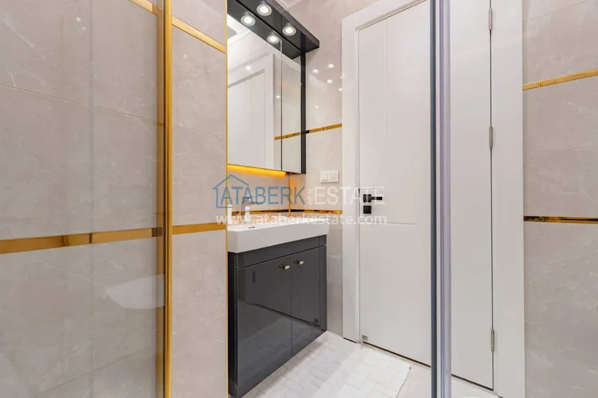 Purchase  1+1 panoramic apartment in the center of Mahmutlar - luxury furniture, the sea within walking distance 14 