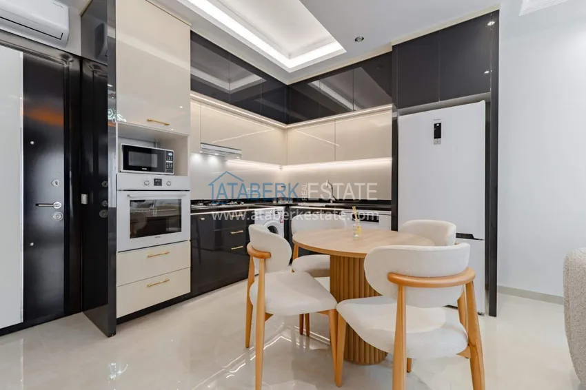 Purchase  1+1 panoramic apartment in the center of Mahmutlar - luxury furniture, the sea within walking distance 2 