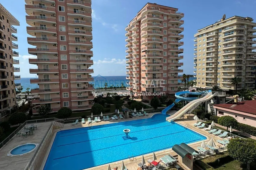 Citizenship real estate in Alanya - 2+1 apartment with sea view, Mahmutlar, first coastal 2 