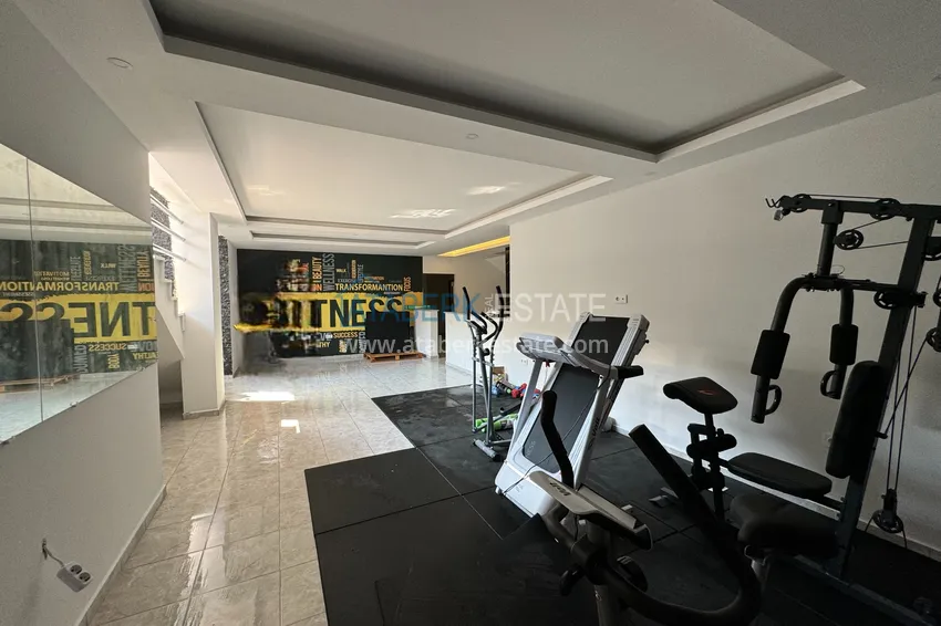 1+1 apartment in Alanya with sea view in Kargicak 10 