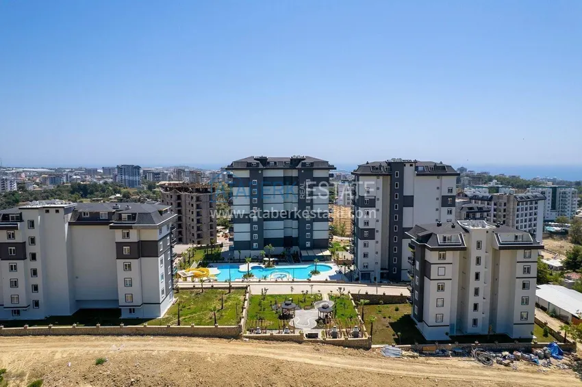 Real estate in Alanya with installments up to 1 year - new 1+1 apartment with sea view in Avsallar 6 