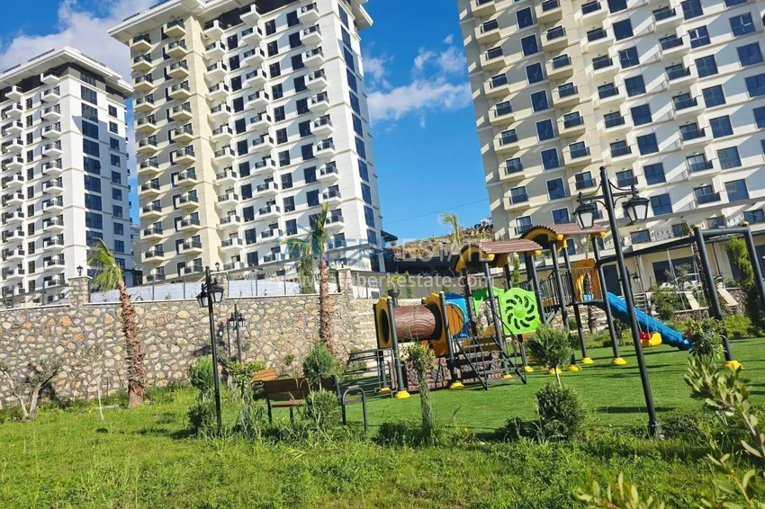 Real estate in Alanya with sea view - 1+1 apartment in Mahmutlar 13 