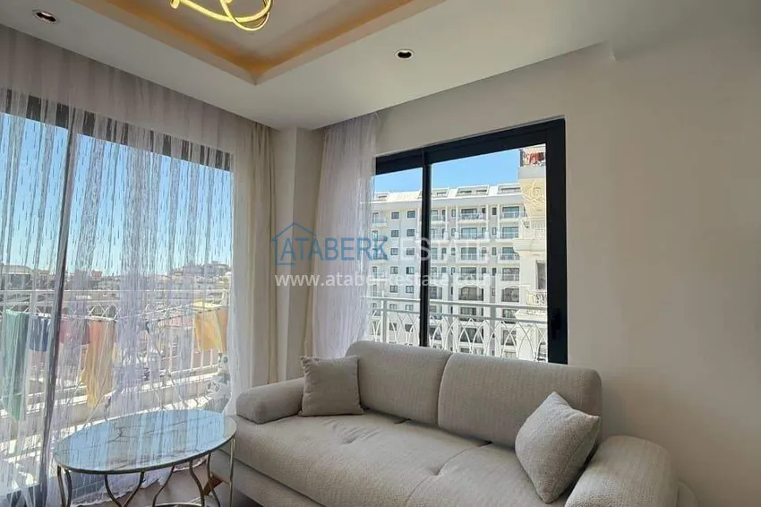 Purchase  Real estate in the center of Alanya - 1+1 apartment with a view of the fortress and the sea near Cleopatra beach 6 