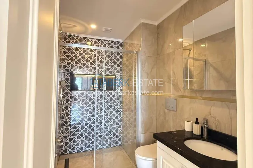 Purchase  Real estate in the center of Alanya - 1+1 apartment with a view of the fortress and the sea near Cleopatra beach 9 