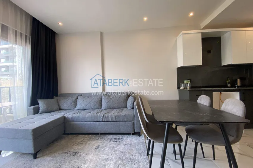 Purchase  1+1 furnished apartment in Alanya, Oba district   4 