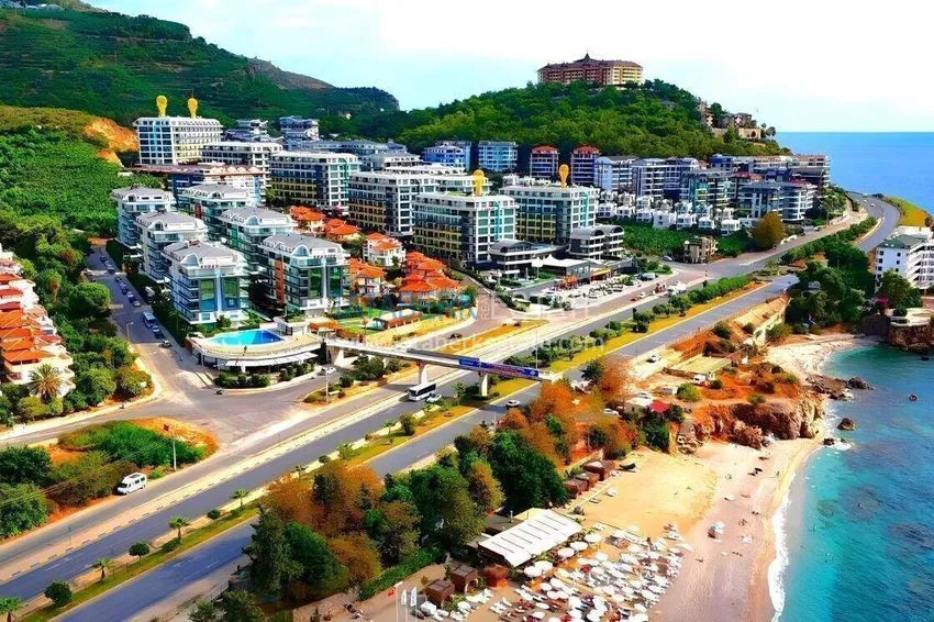 2+1 apartment on the first line in Alanya, Kargicak district — furniture, side sea view 1 