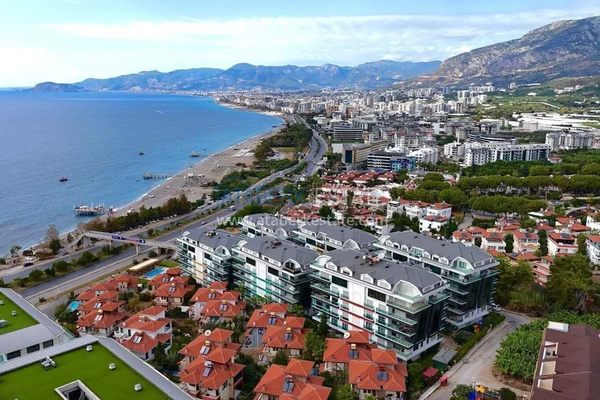 2+1 apartment on the first line in Alanya, Kargicak district — furniture, side sea view 3 