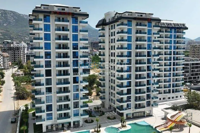 Rent in Alanya - 2+1 apartment with furniture and sea view in Mahmutlar B45 1 