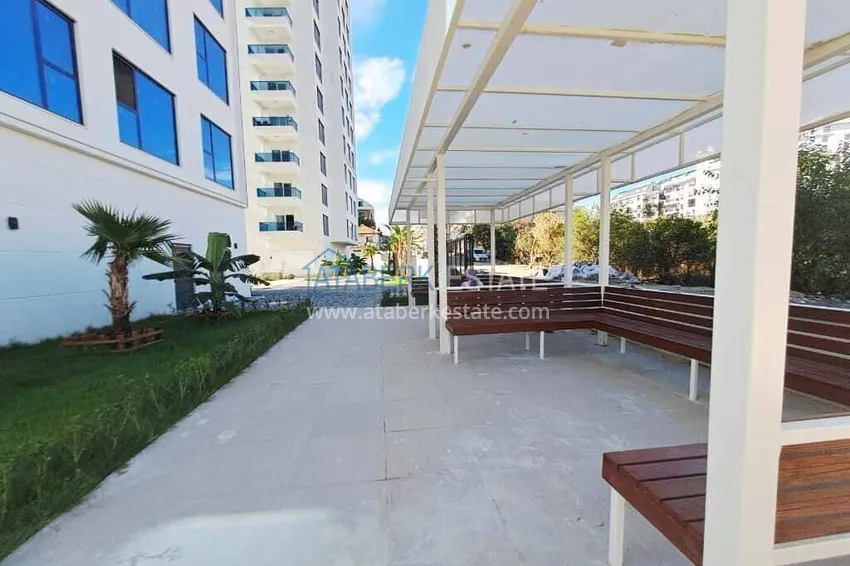Rent in Alanya - 2+1 apartment with furniture and sea view in Mahmutlar B45 10 