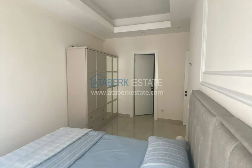 Purchase  Rent in Alanya - 2+1 apartment with furniture and sea view in Mahmutlar B45 11 