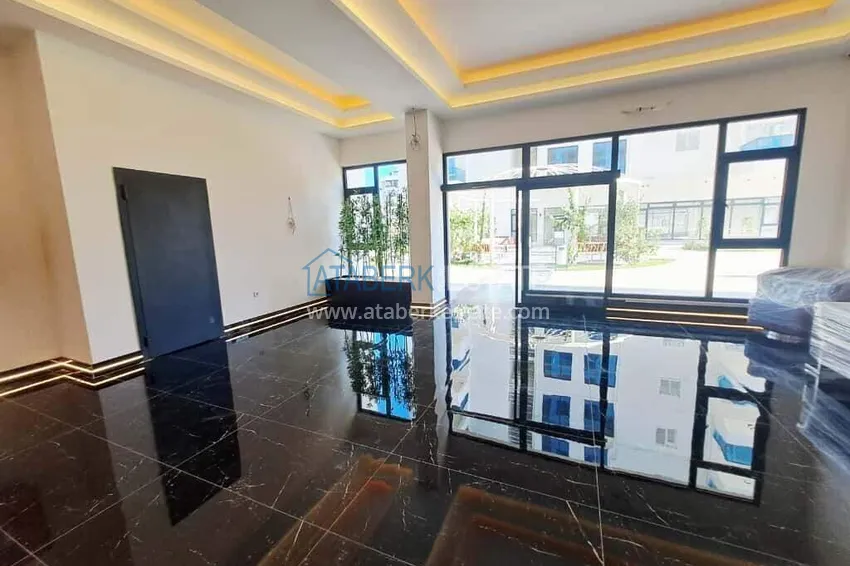 Rent in Alanya - 2+1 apartment with furniture and sea view in Mahmutlar B45 12 