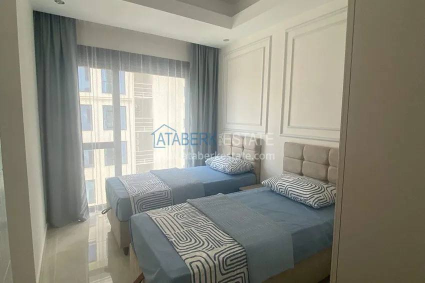 Purchase  Rent in Alanya - 2+1 apartment with furniture and sea view in Mahmutlar B45 13 