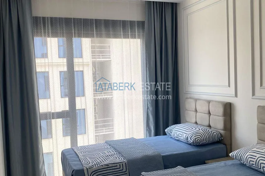 Purchase  Rent in Alanya - 2+1 apartment with furniture and sea view in Mahmutlar B45 14 